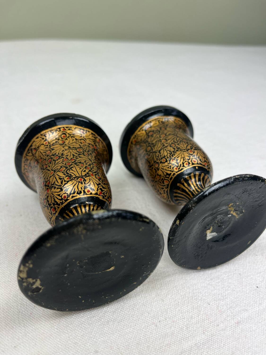 Pair of lacquered wooden candlesticks