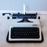 Portable, functional typewriter with user manual