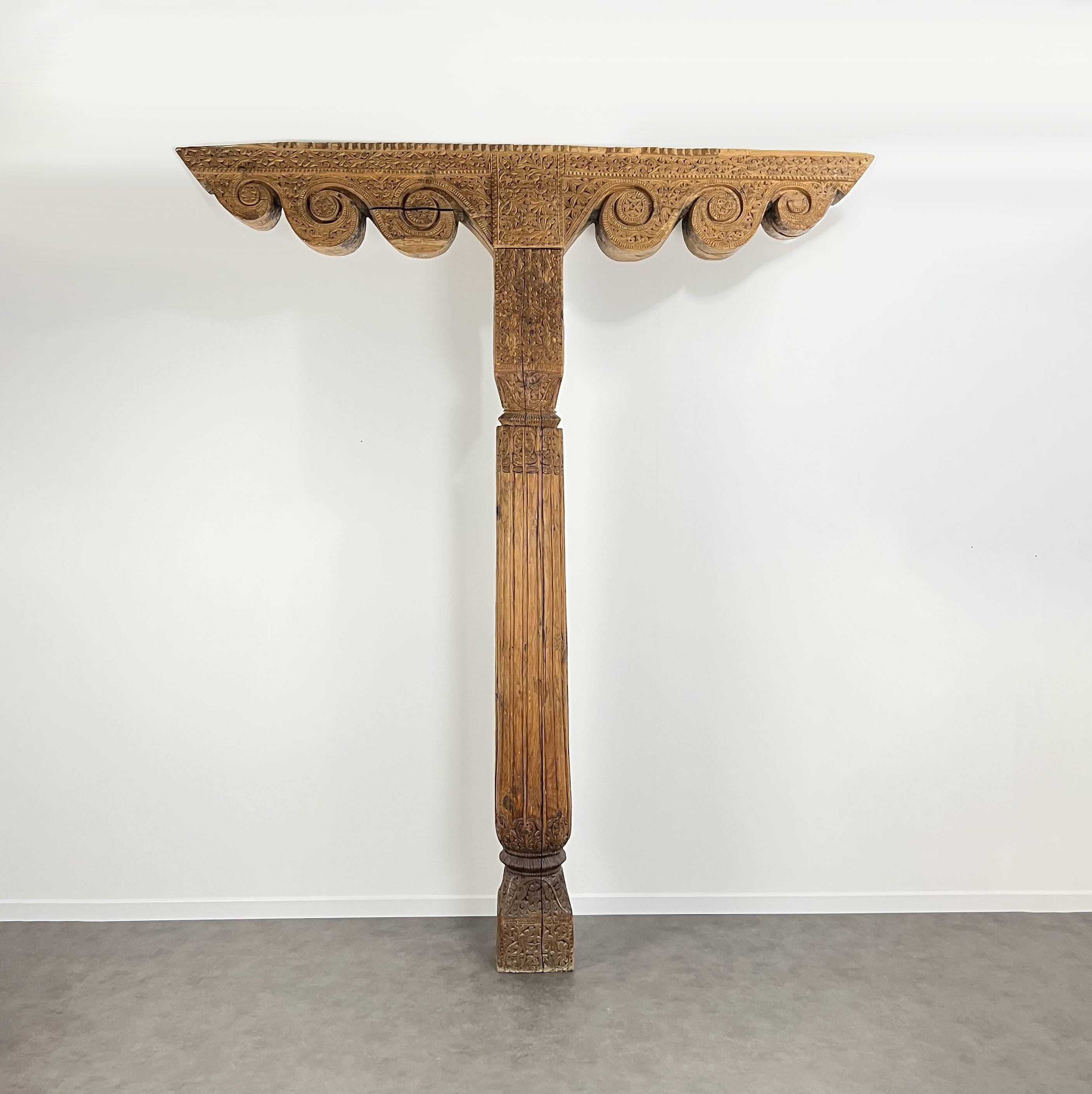 Ancient large carved cedar pillar column from Pakistan, India.