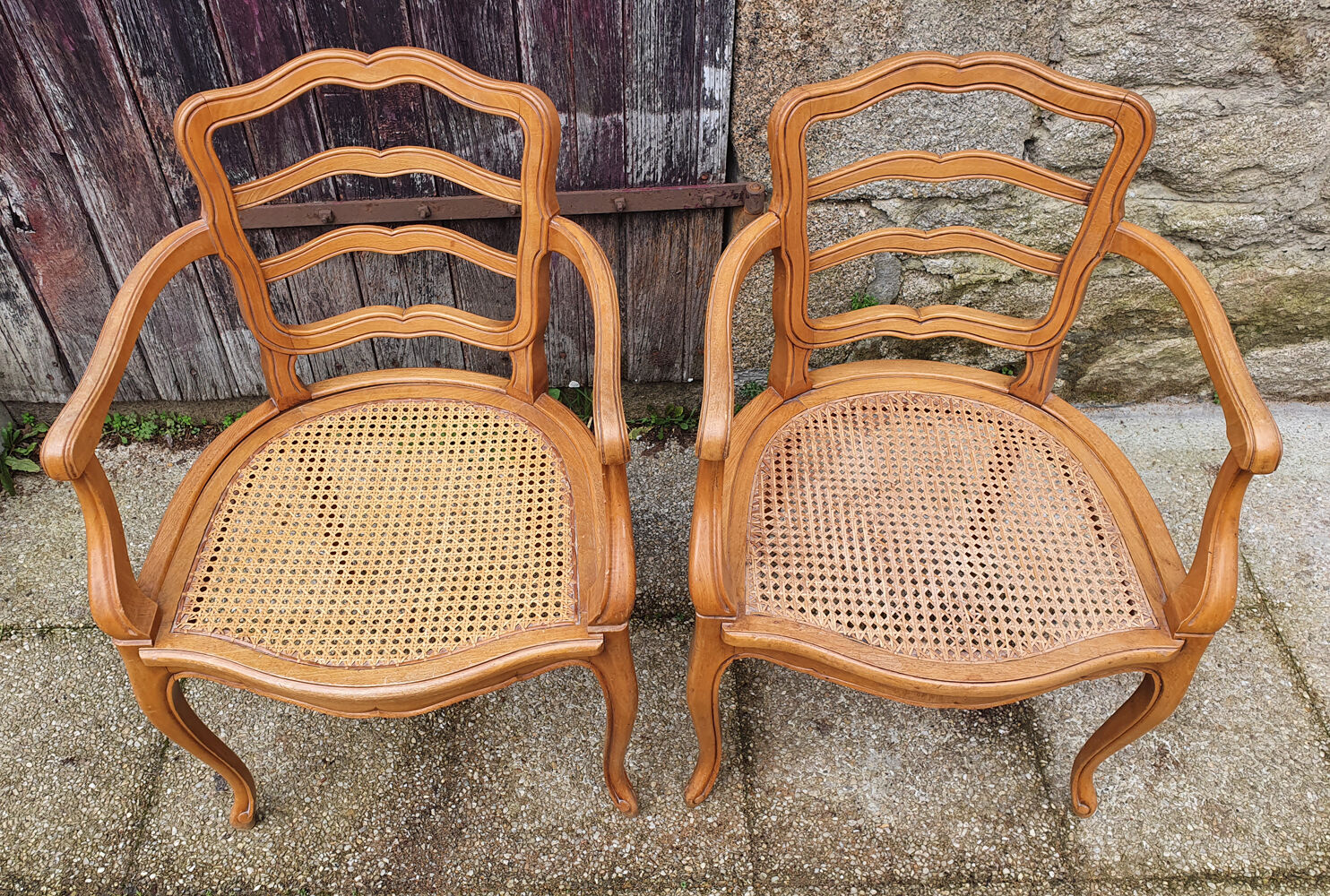 Pair of blond wood cane armchairs from the 60s