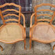 Pair of blond wood cane armchairs from the 60s