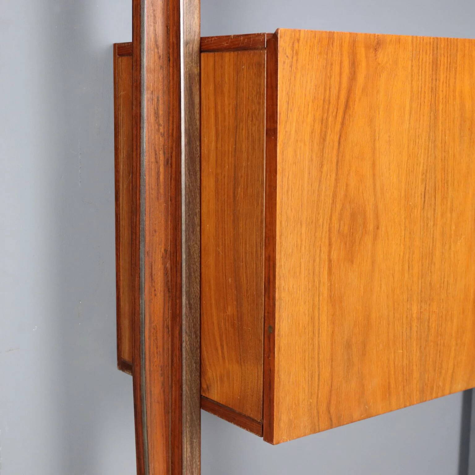 Vintage library from the 1950s-60s with a bar compartment.