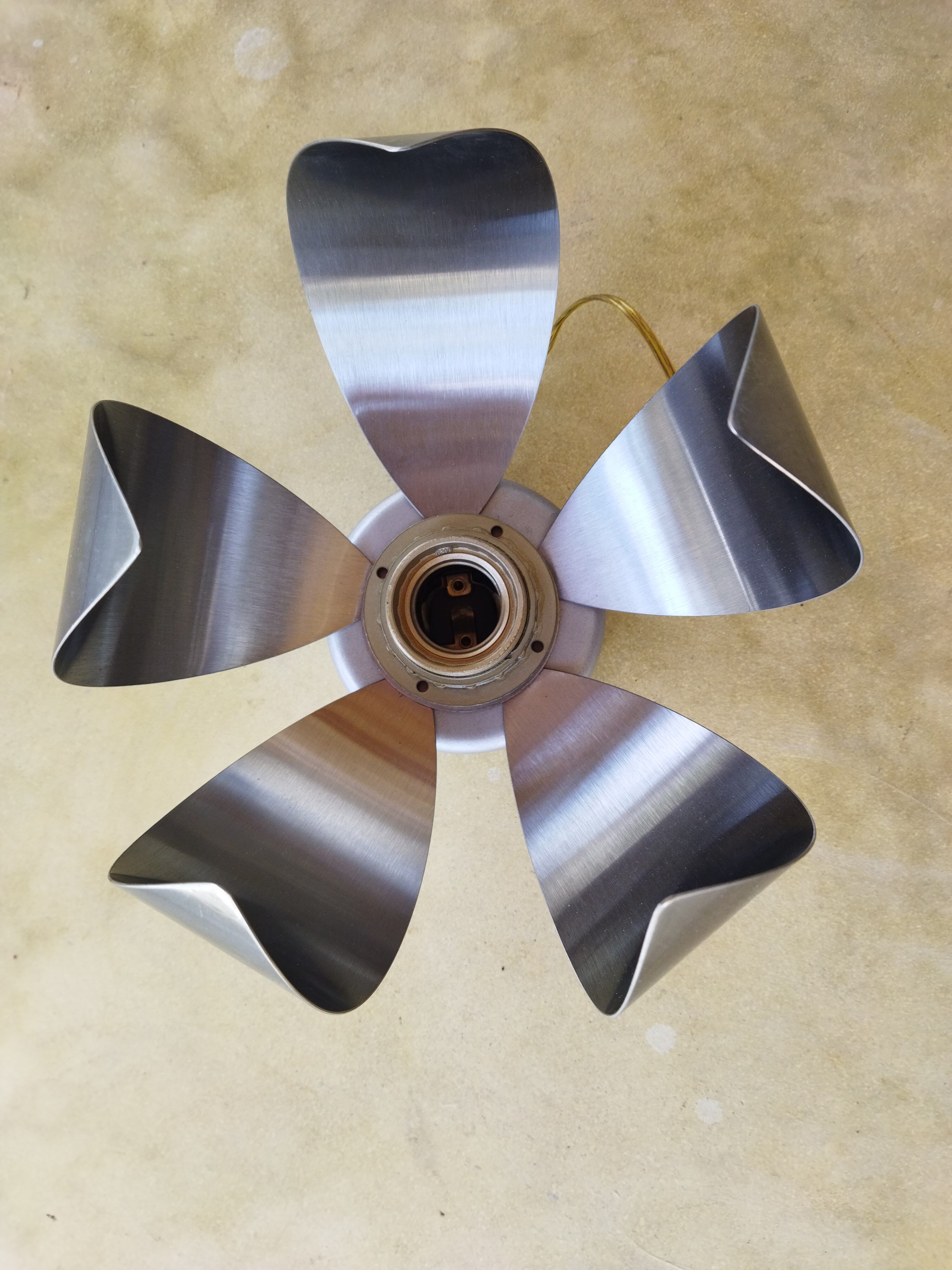 A set of brushed stainless steel flowers sconces