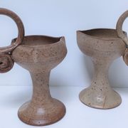 Pair of vintage “heart” sandstone candlesticks