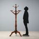 Antique coat rack in lime wood stained walnut, Italy, 19th century.