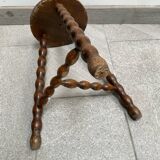 Wooden tripod farm stool