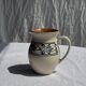 Vintage white pitcher with stylized blue plant frieze H17.5