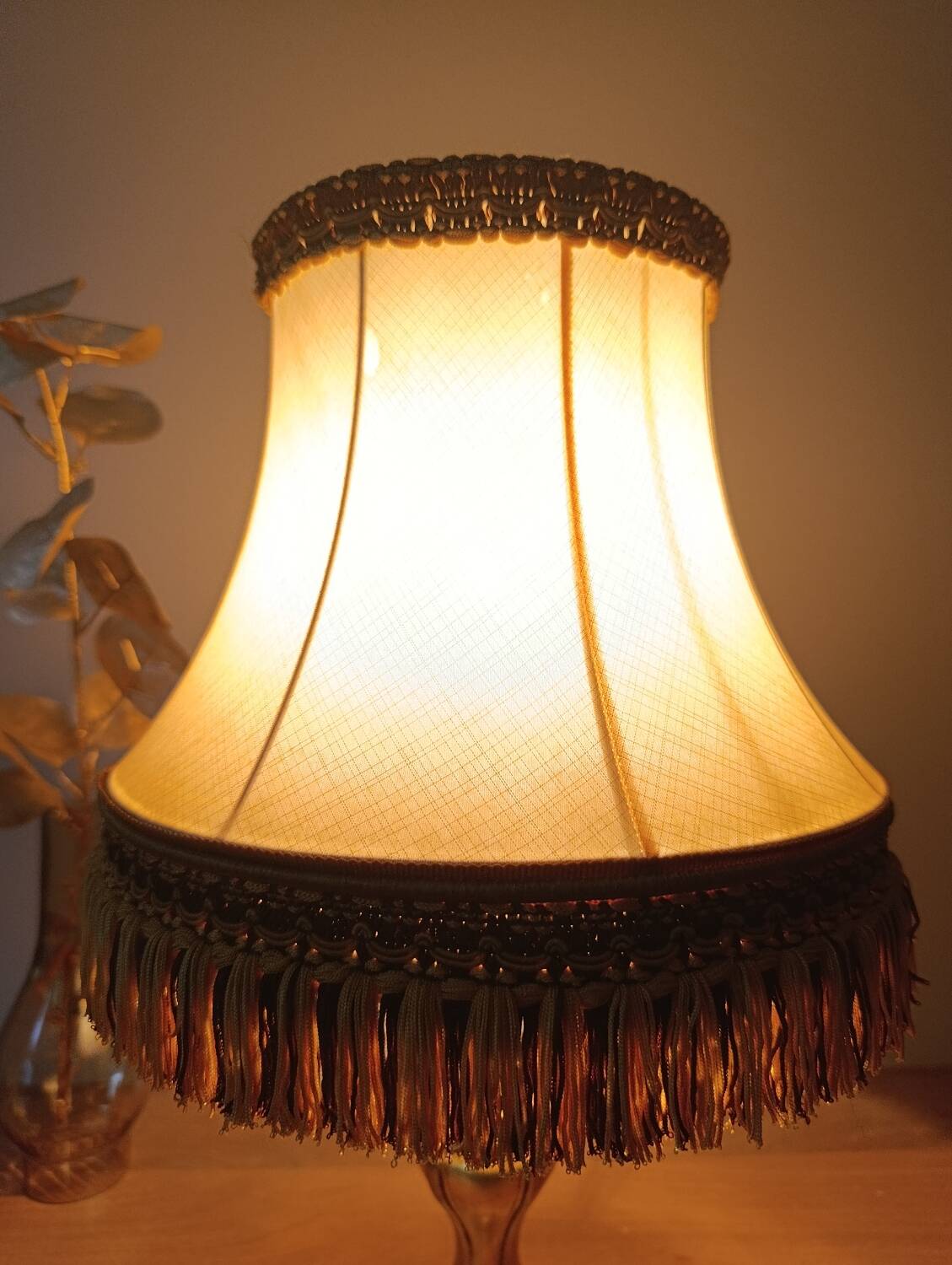 Chic retro lamp with a bronze pagoda fringe shade, 1950.
