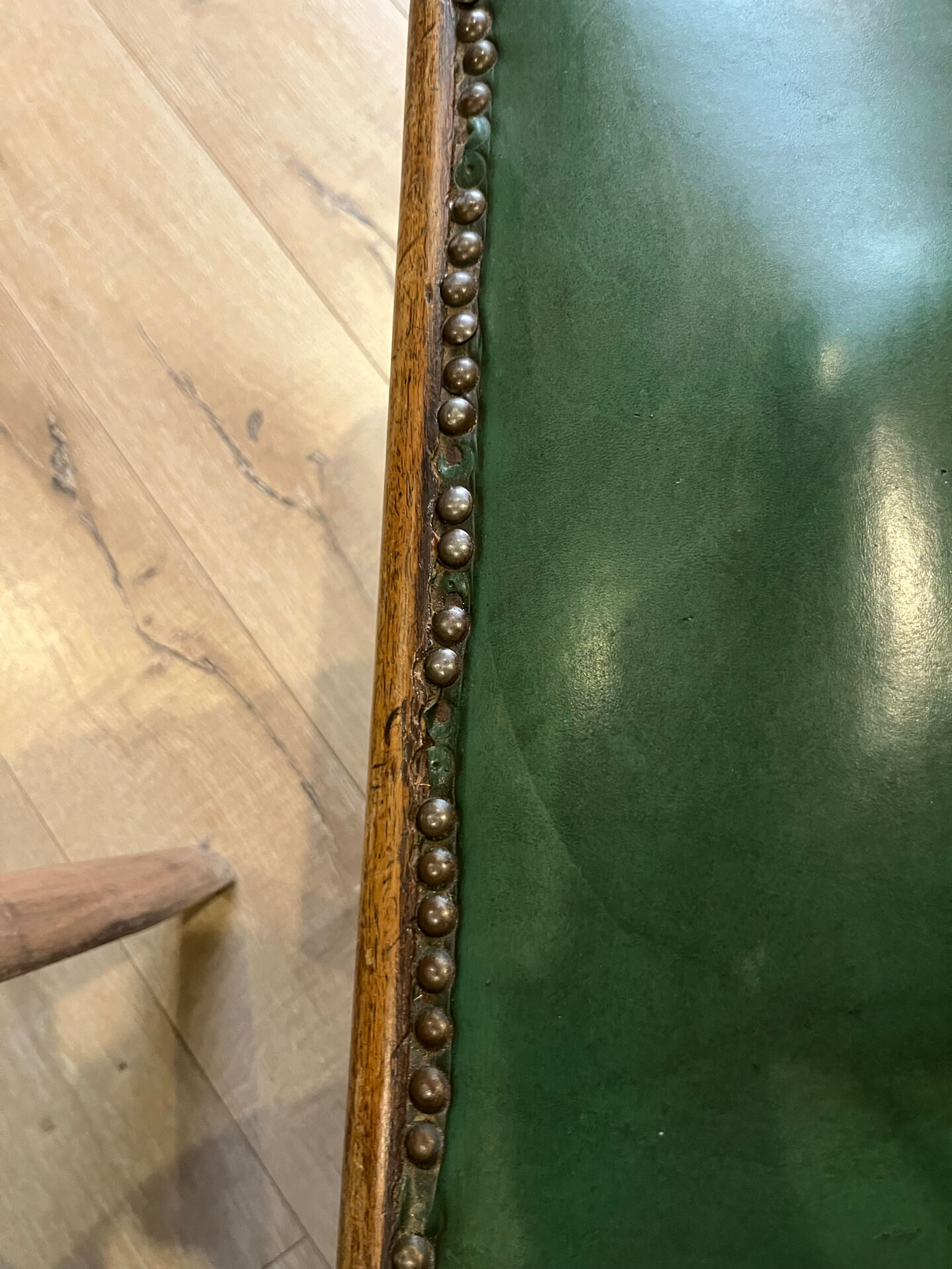 Pair of green leather gondola chairs Art Deco by De Coen