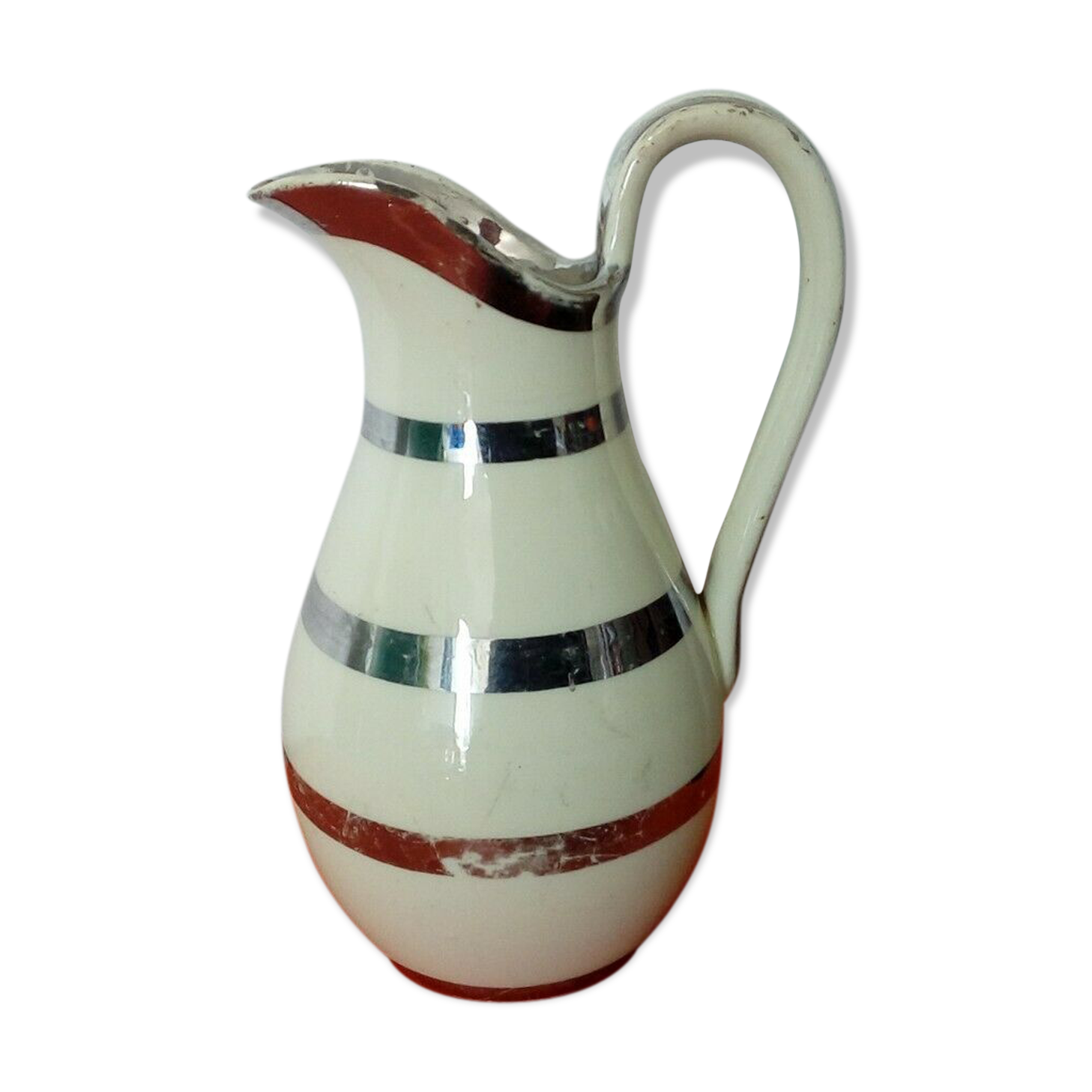 Old earthenware jug from Langeais with a spout.