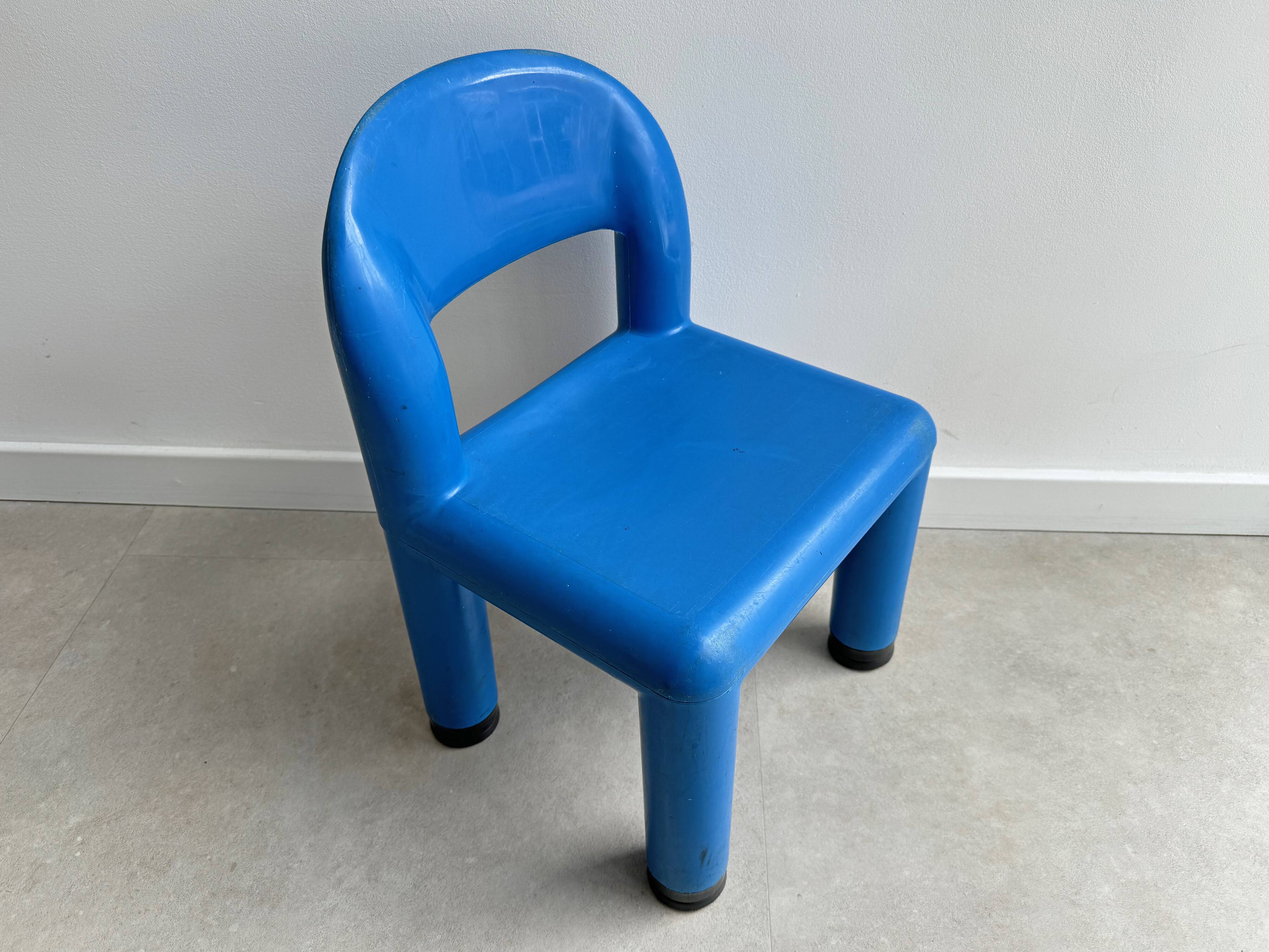Blue plastic space age kids chair, bold italian design