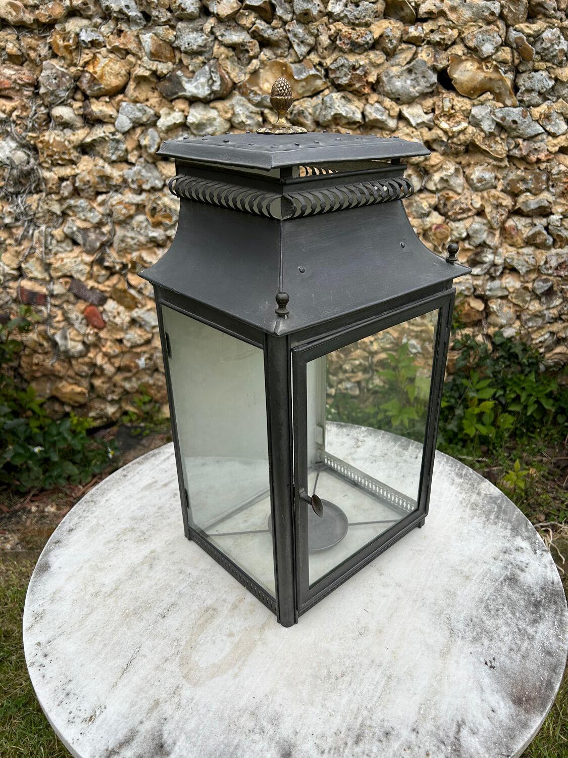 Tin and glass lantern