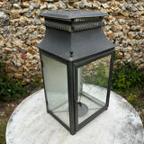 Tin and glass lantern