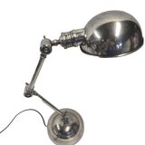 articulated desk lamp in chrome-plated brass