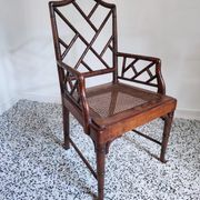 Asian canine armchair in wood in imitation of bamboo