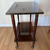 Vintage side table in varnished wood, with casters and gold threads