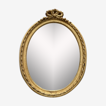 Oval wall mirror in baroque gilded plaster frame 29x20cm