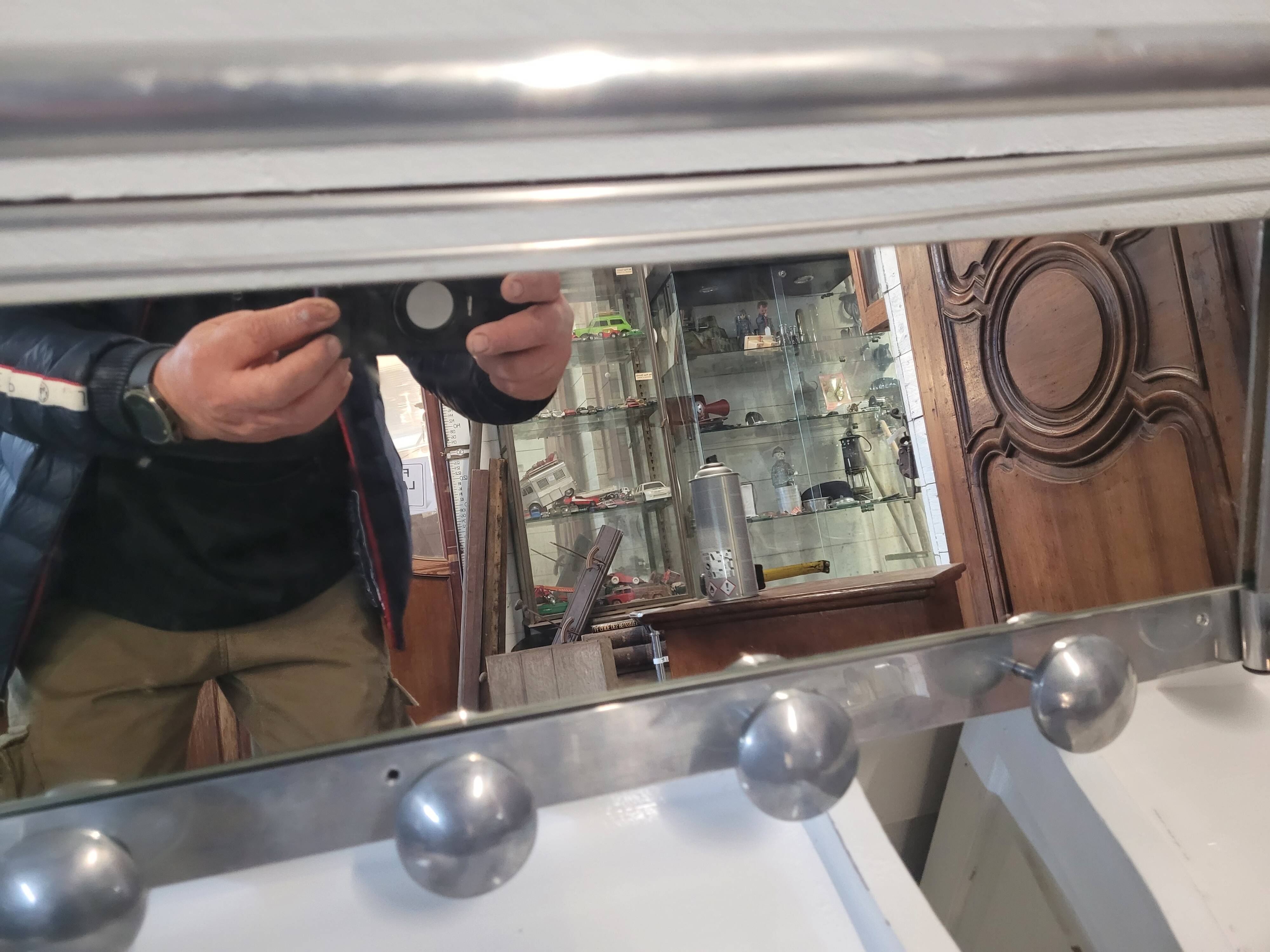 Aluminum wall coat rack with pivoting mirror from the 60s
