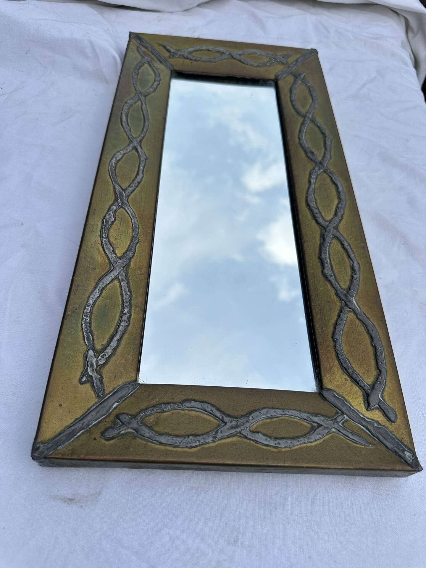 Brutalist mirror by Jean Goardere