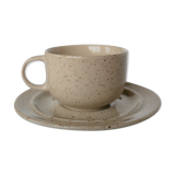 Coffee cup and vintage pyrity sandstone subcup