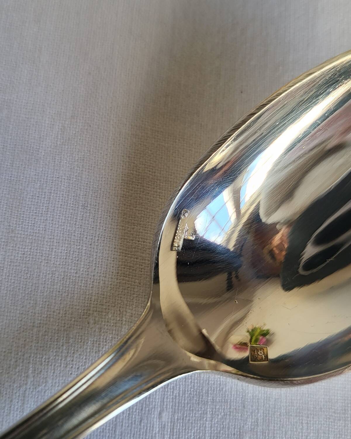12 small silver-plated metal spoons by Guildart