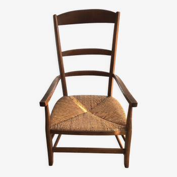 Antique armchair with straw seat