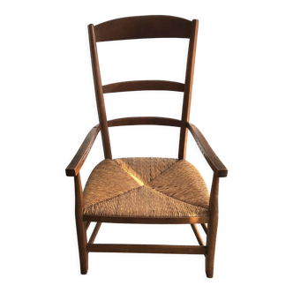 Antique armchair with straw seat