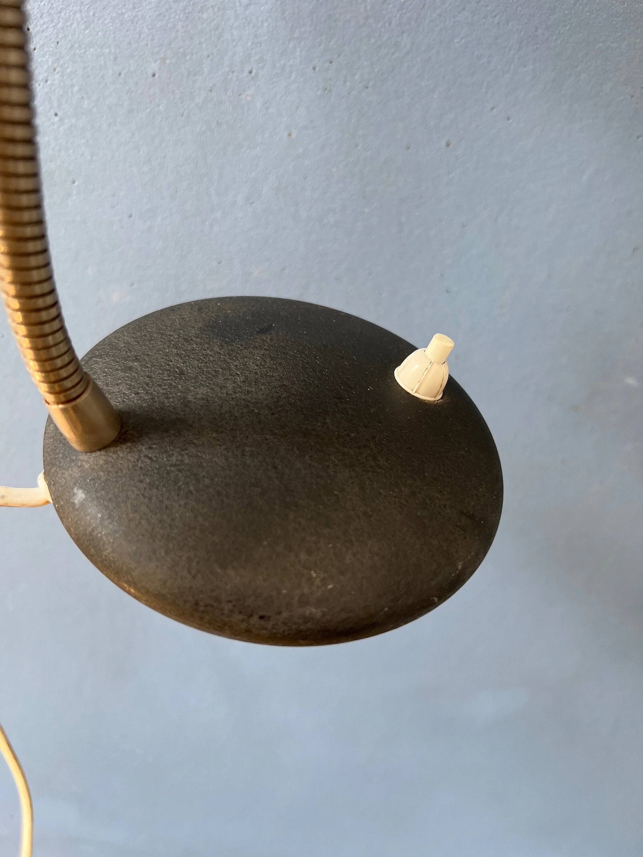 Small black metal desk lamp in Bauhaus style.