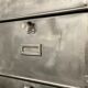 Industrial cladding furniture in brushed and patinated steel