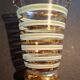 Vintage vase with green and gold trim.