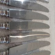 11 silver-plated dessert knives, Ercuis goldsmith, Roses model, Louis XVI style