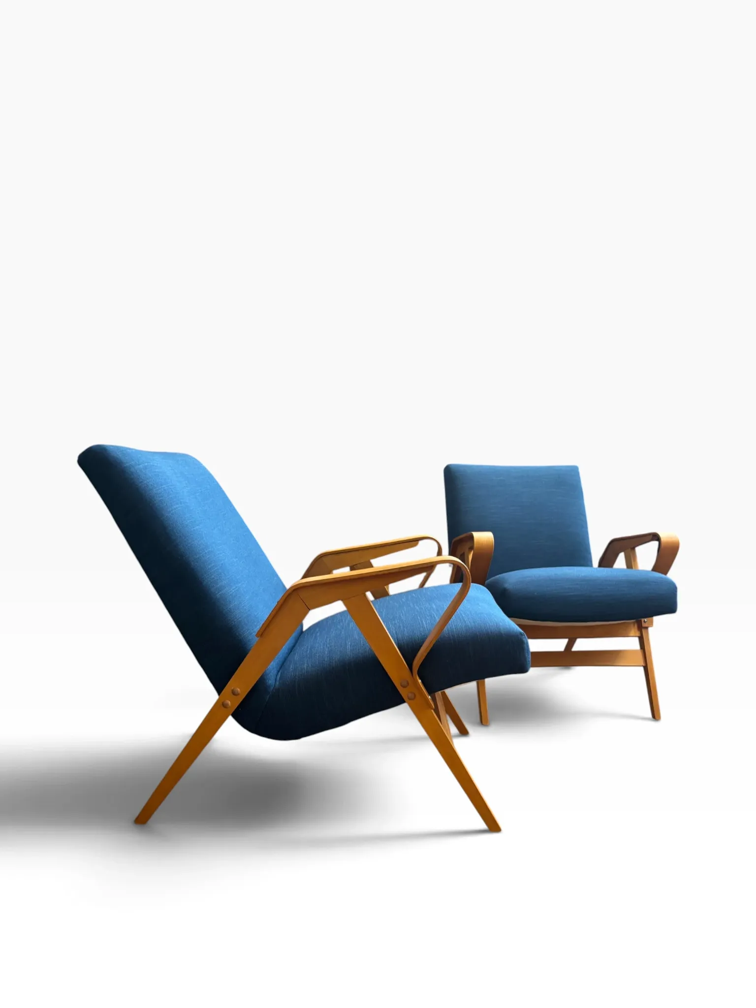 Set of 2 blue lounge chairs restored by František Jirák for Tatra Nabytok.