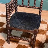 Petit fauteuil d’angle