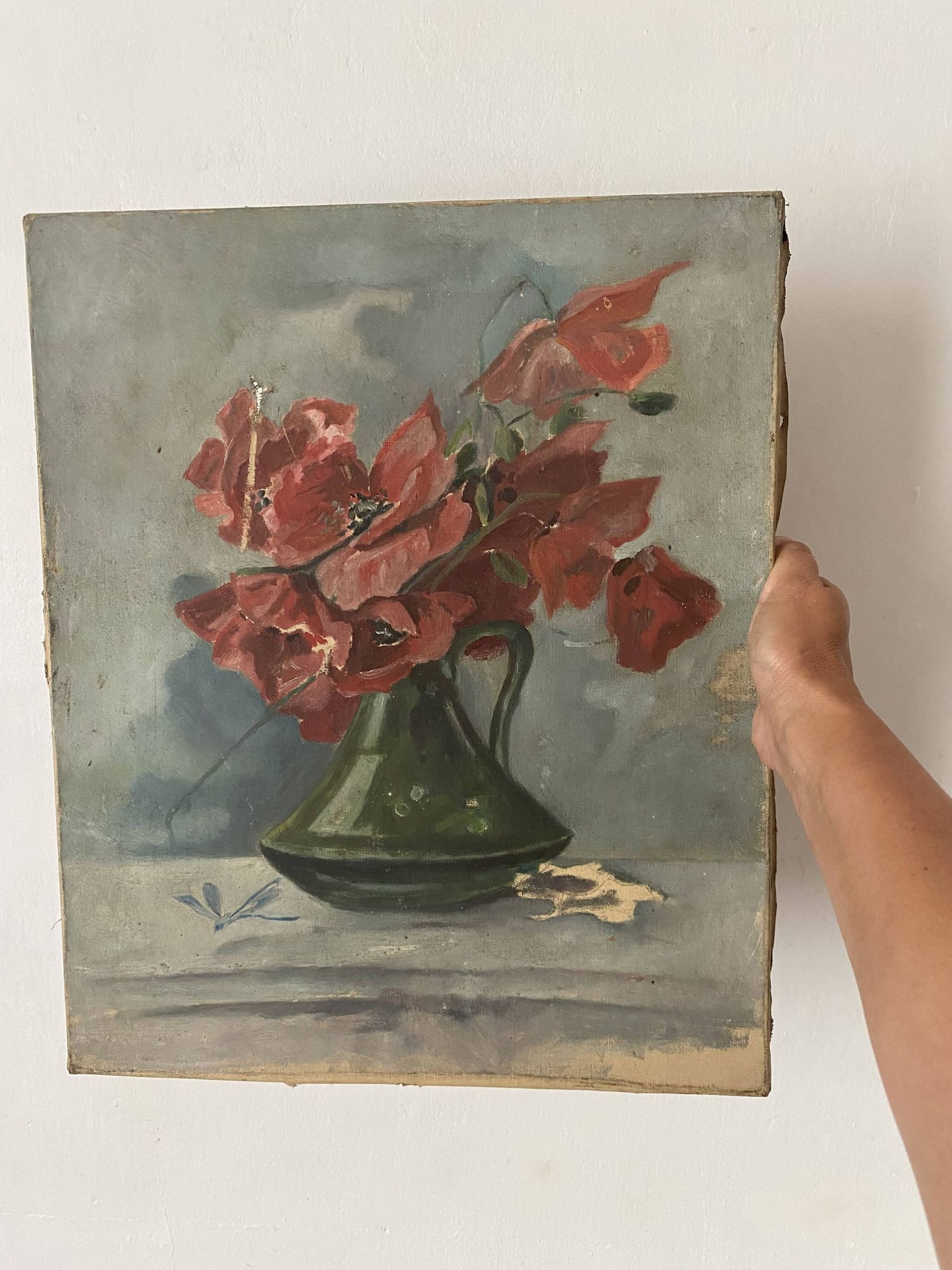Old painting of a bouquet of poppies, canvas on a flower frame