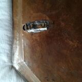 Old oriental tray in chiseled copper