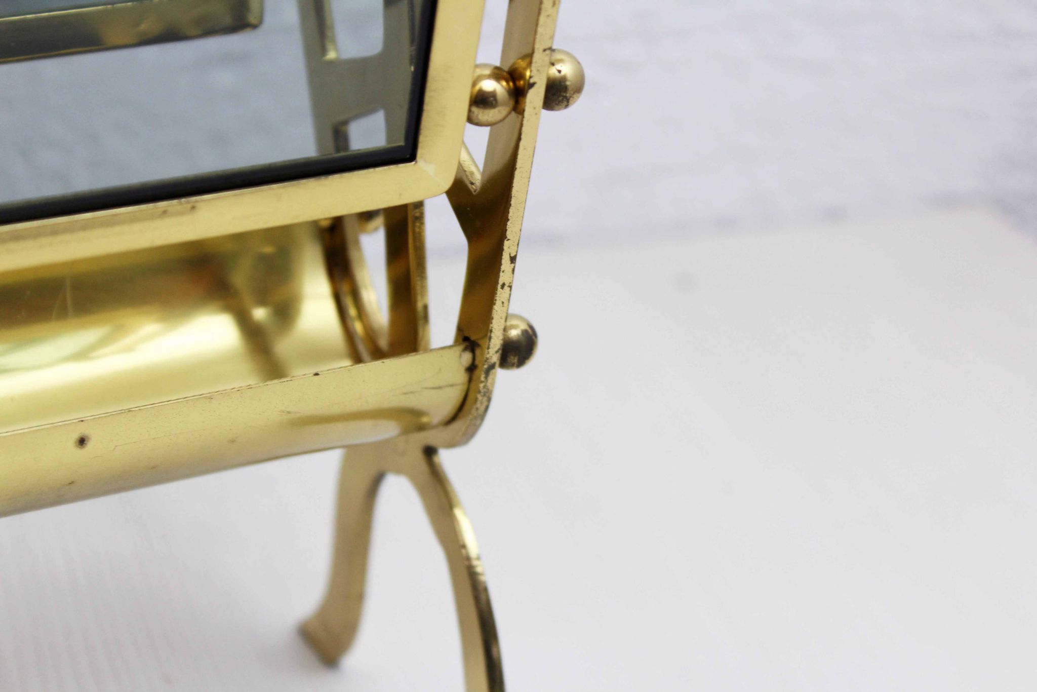 Glass and brass magazine rack, 1970s