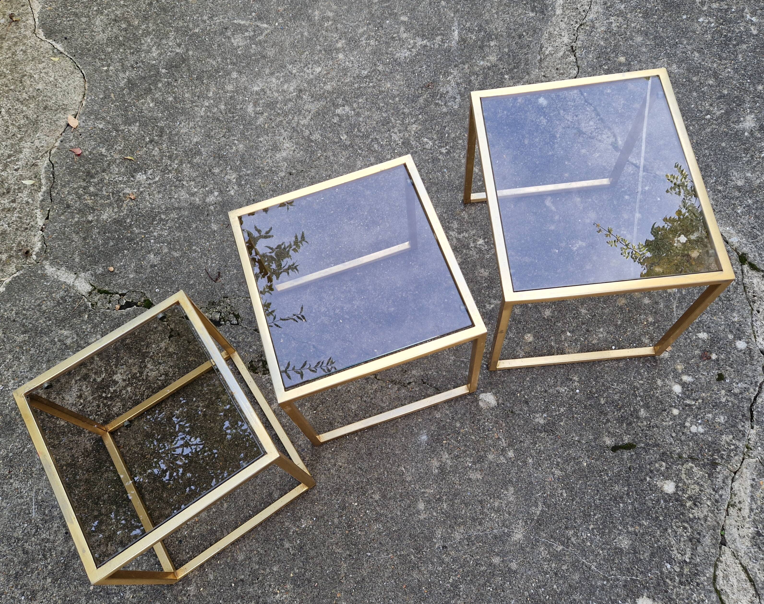 Vintage 1980s gold metal and smoked glass nesting tables