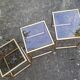 Vintage 1980s gold metal and smoked glass nesting tables