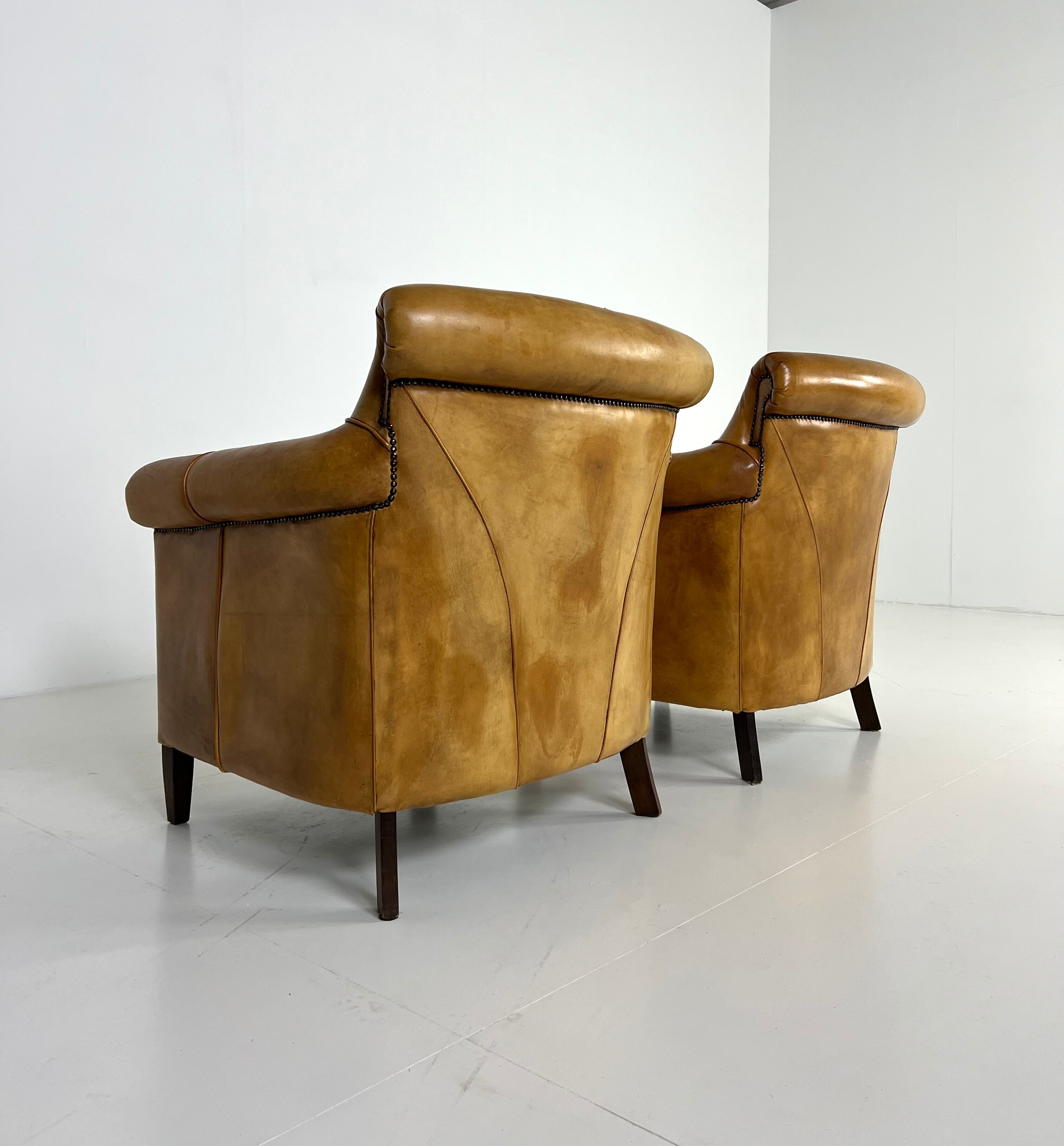 Ensemble de 2 fauteuils club en cuir