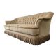 Canapé vintage beige avec franges
