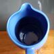 Blue ceramic pitcher