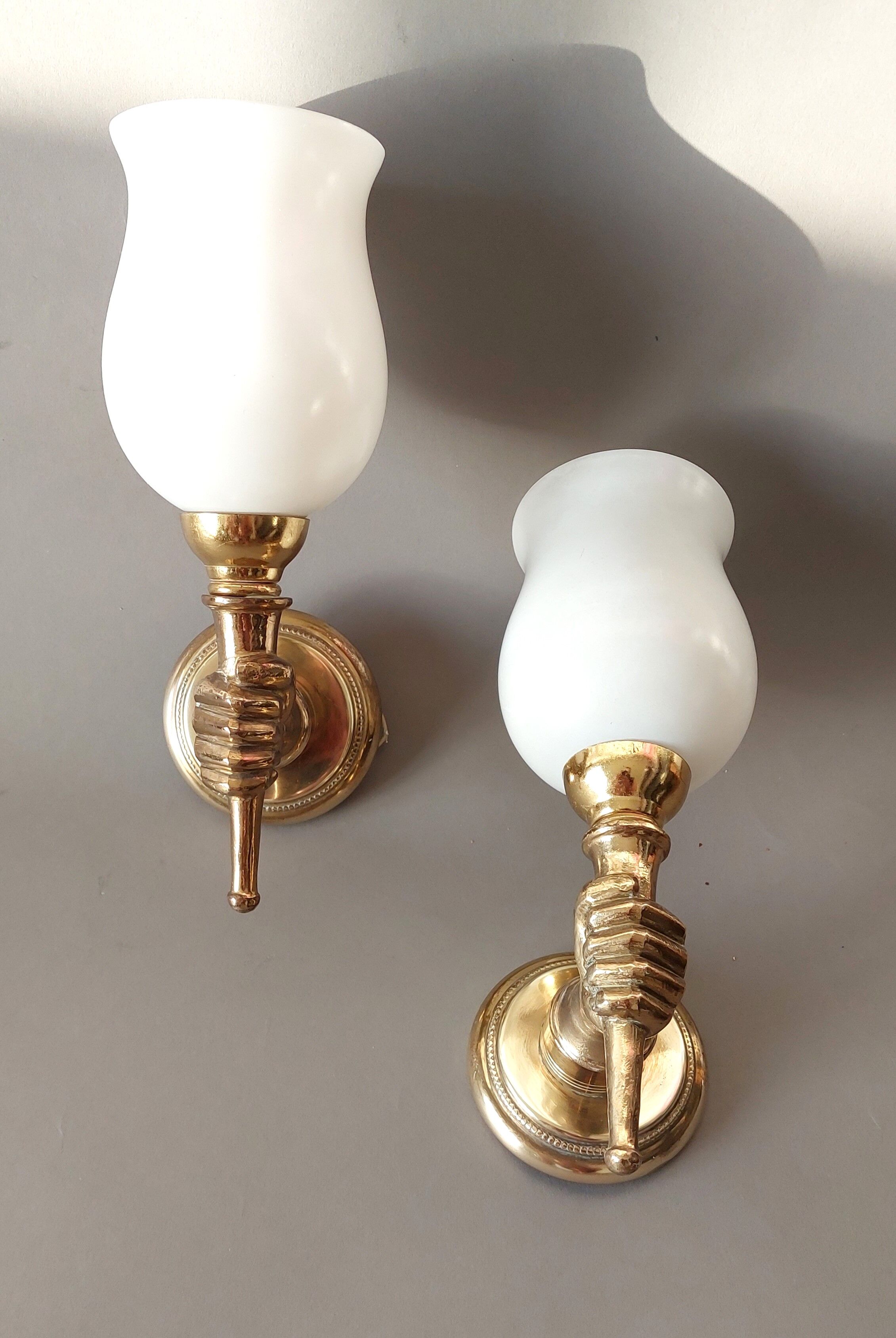 Pair of bronze and gilded brass sconces by John Devoluy 1950.