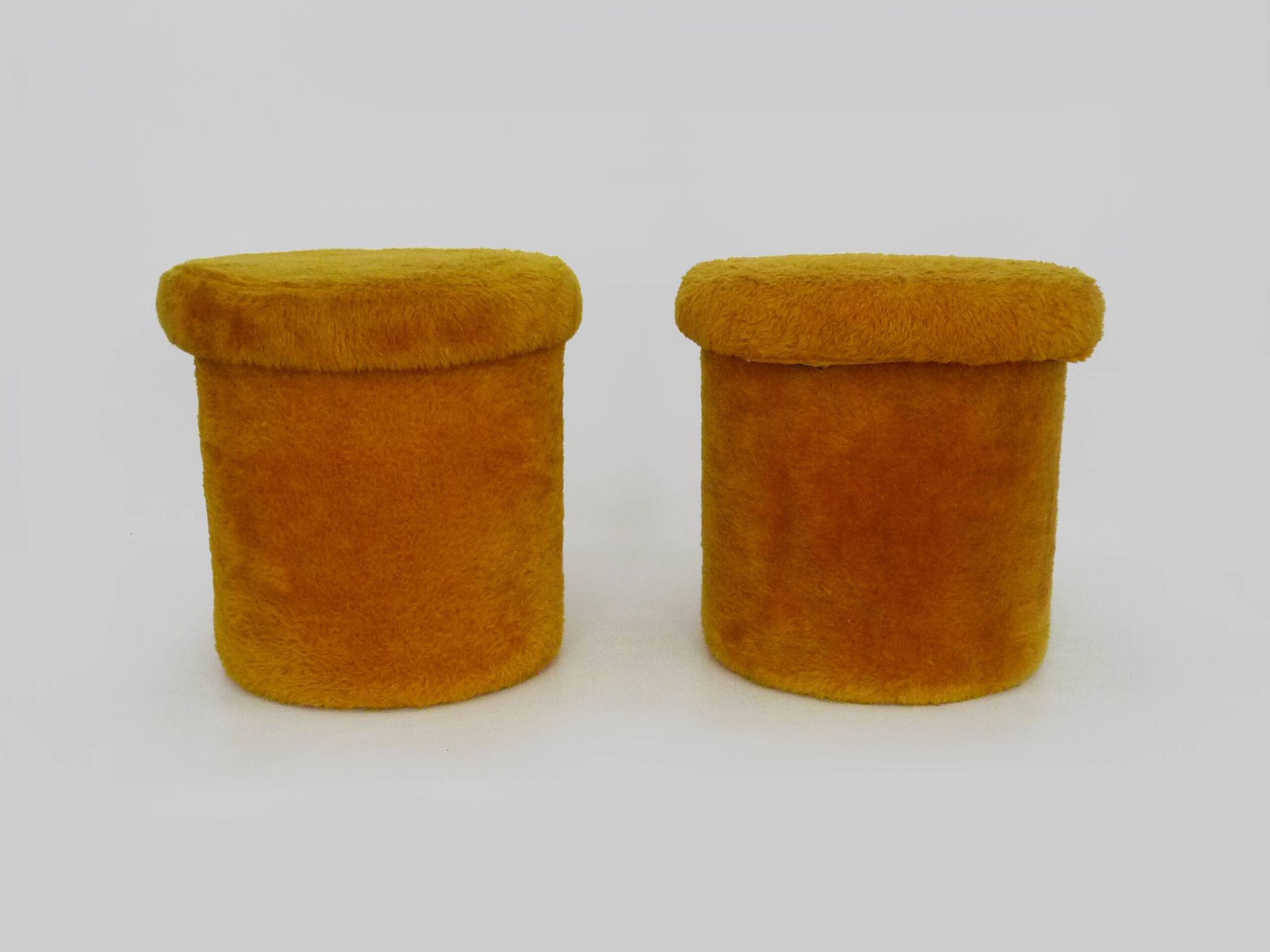 Pair of poufs, fur stools with storage inside, 1970s.