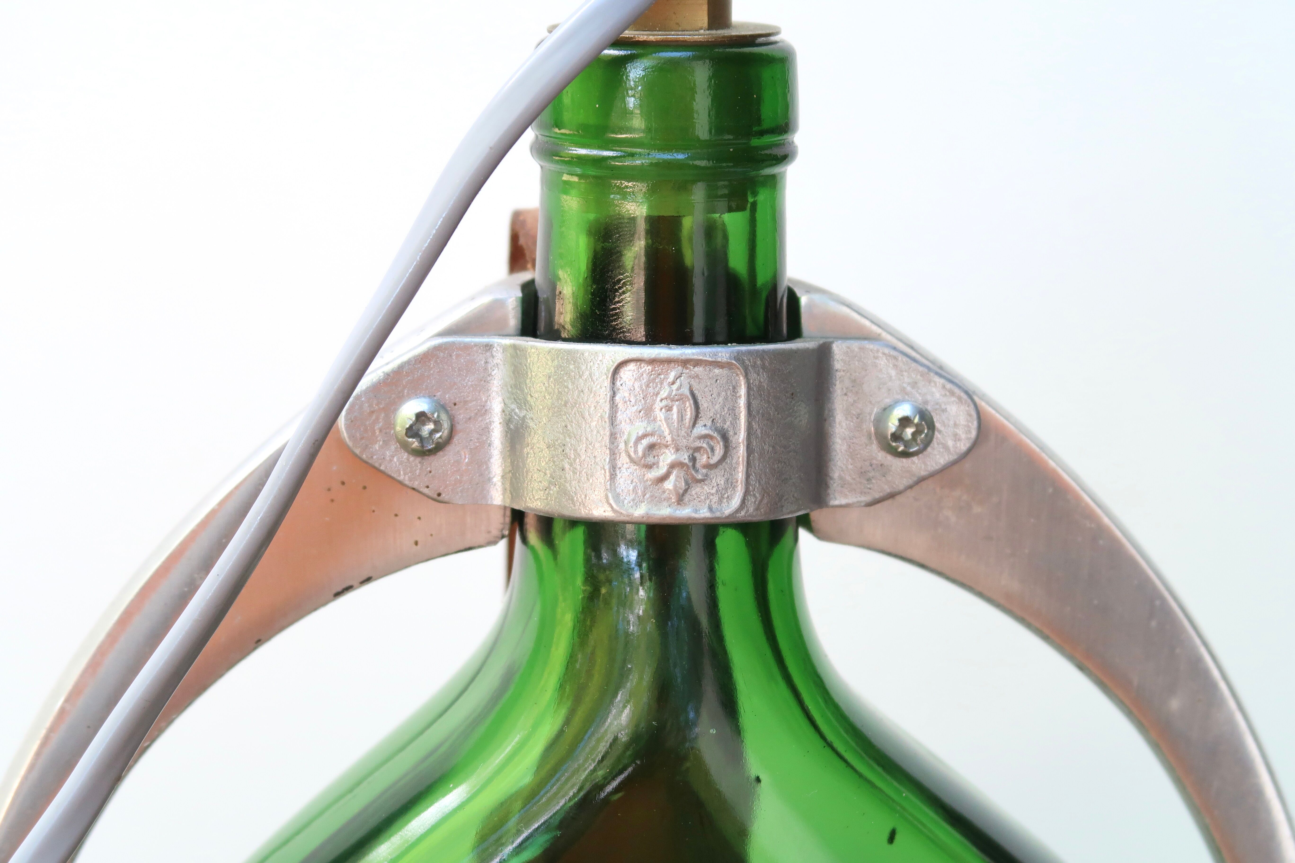 Armagnac Ducastaing bottle lamp and its stirrup, 60s