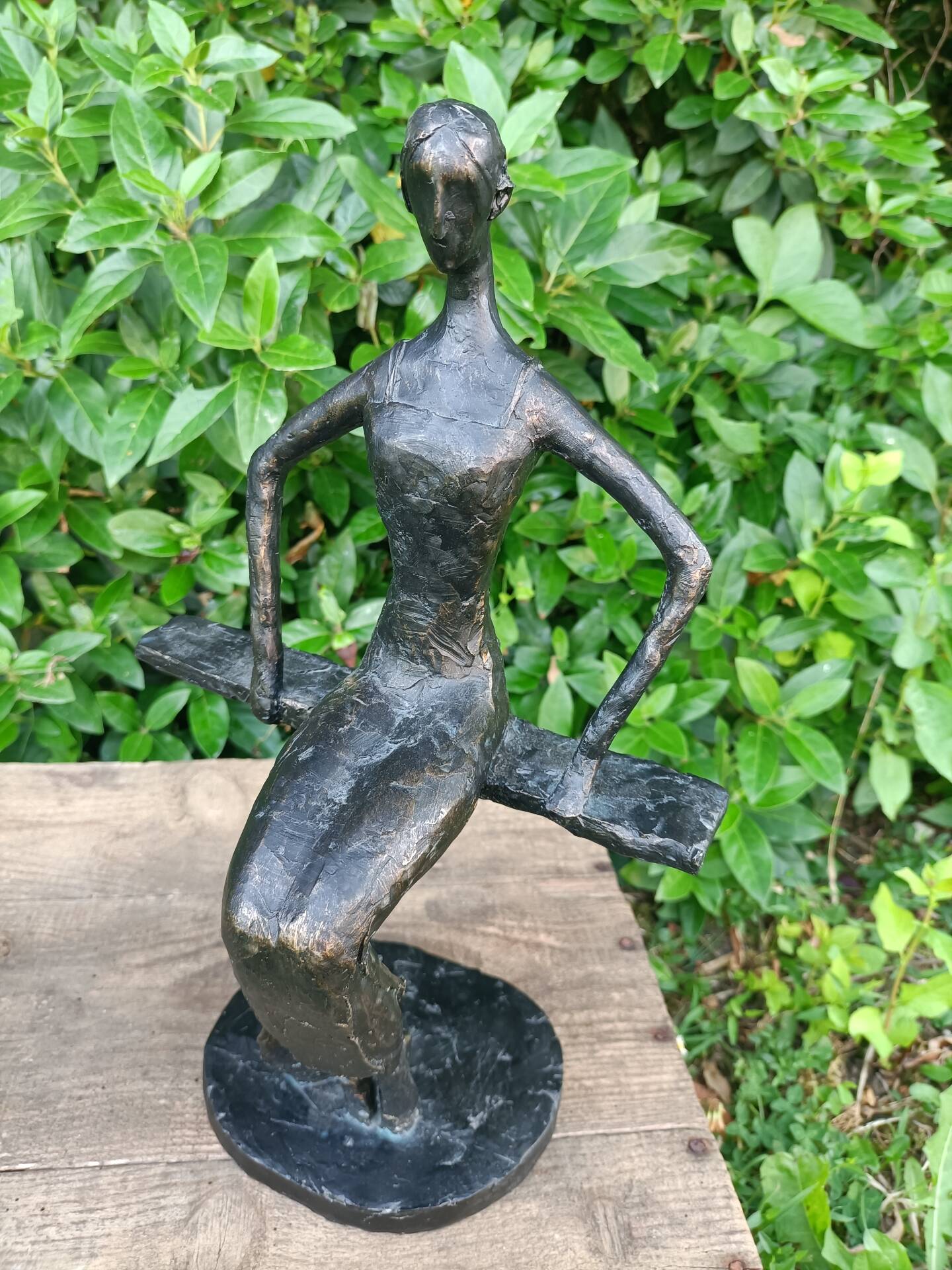 Sculpture of a dancer on a swing signed by Raphaël