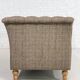Chesterfield sofa in leather, fabric and wood