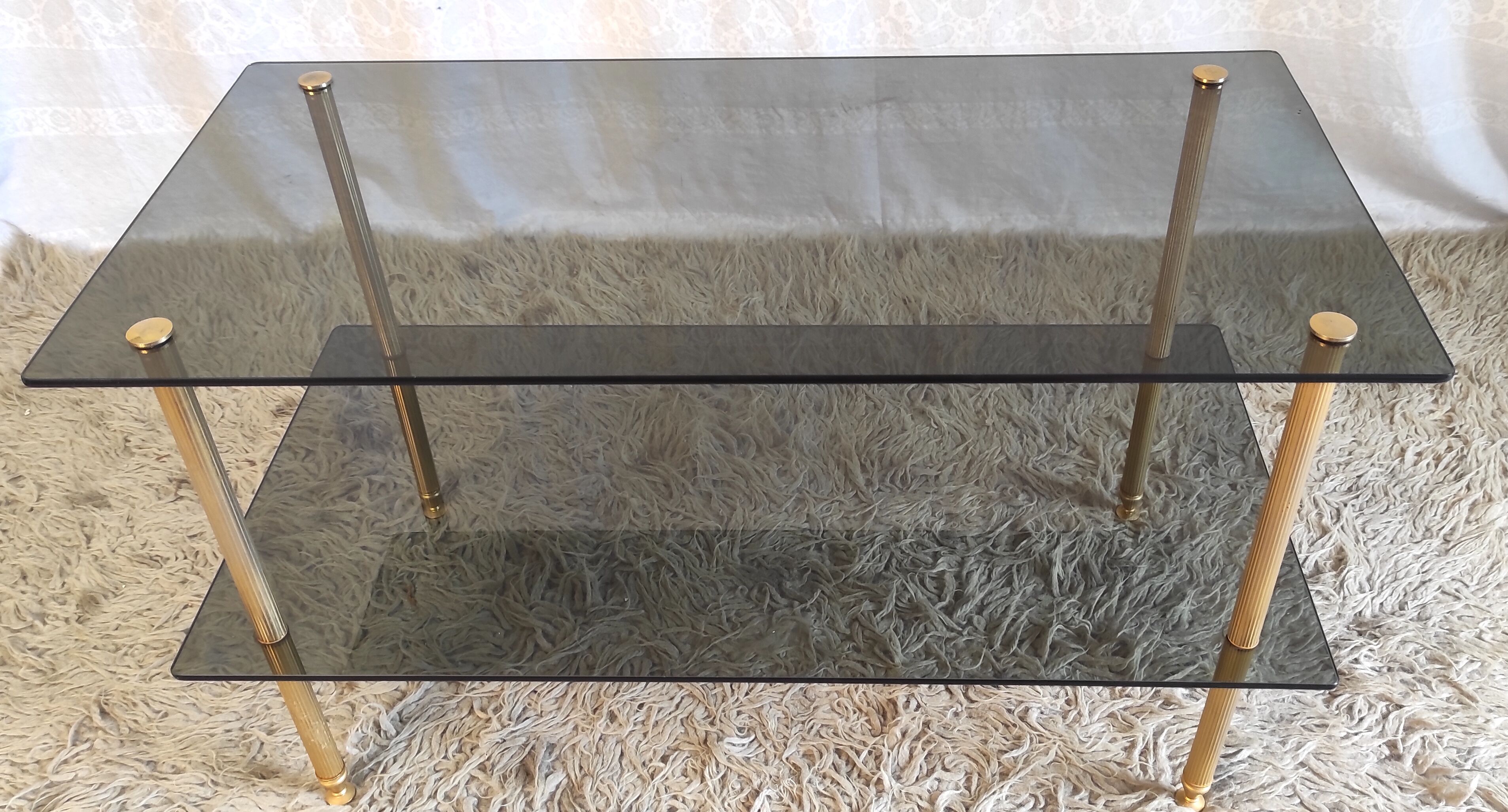 Coffee table in gilded metal and smoked glass – 60s