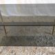 Coffee table in gilded metal and smoked glass – 60s