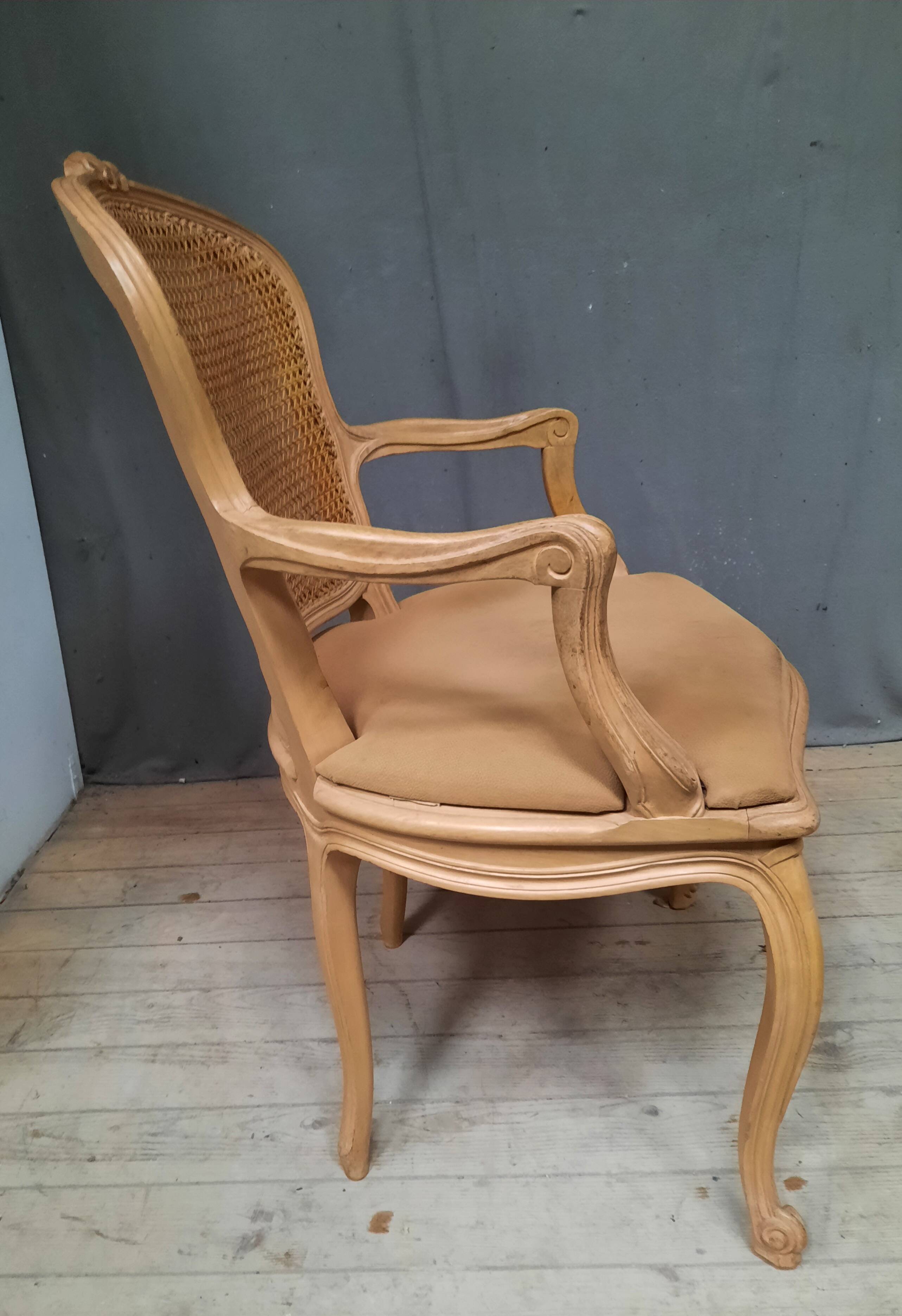 Louis XVI style caned armchair