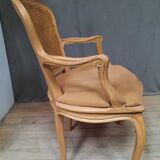 Louis XVI style caned armchair